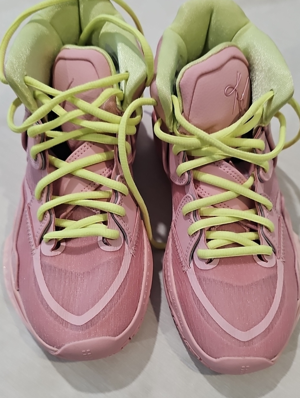 Nike Pink Sneakers with Neon Yellow-Green Collar